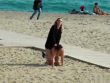 Naked Euro babe disgraced on the beach