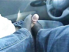 A footjob in stockings in the car