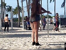 Stretching Her Twat In A Beach