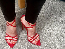 Mrs Mature Feet wearing extremely tight leather trousers and killer heels