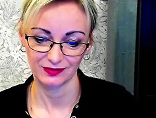 Clothed busty German MILF on webcam posing