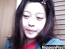 Delightful Japanese Chick Sits On The Latrine And Pees In A Cup