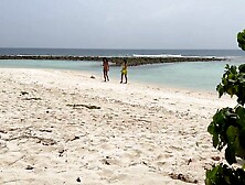 Pervert cummed on vacationing girls while they were sunbathing on a public beach