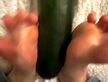 simulating footjob with an gigantic zucchini by a virgin sweet bitch