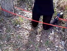 Laura is tied and hooded on high heels and tights,