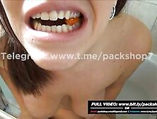 Hot woman devours live fish in the bathtub