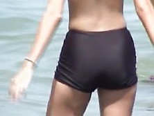 Candid babe wearing swimsuit with bra and black shorts 07e
