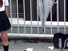 Naughty Students Use Open Umbrellas To Capture Golden Shower