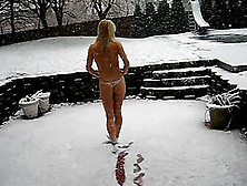 A Cute Blonde Goes Out In The Snow Wearing Just Her Panties