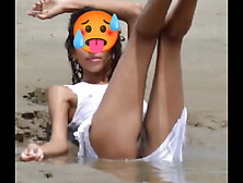 Nude model in a public beach photoshoot.  Small boobies nice behind