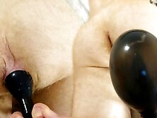 My bitch's booty is completely filled with GIGANTIC 15 PUMPS INFLATABLE REAR-END PLUG.  Extreme anal play!