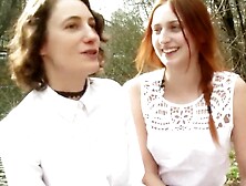 Blonde and redhead lesbian girls are sharing one huge dildo