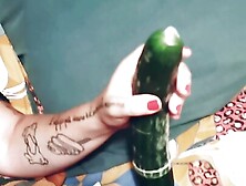 Wife with cucumbers