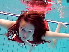 Red Dressed teen Swimming With Her Eyes Opened (18+)