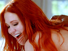 Redhead with a banging figure is banged by a black cock