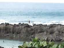 Big Wave Slams Couple Into Jagged Rocks