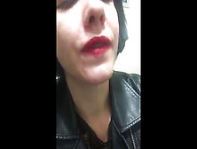 Attractive Goth Skank Smokes Cigarette Close Up In Red Lipstick