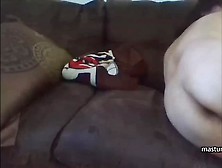 Mexican Mom masturbates on the couch
