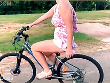 Wife rides bike in public cleavage flashing dare