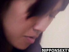 Peepers lens films cute Japanese girl trimming her bush